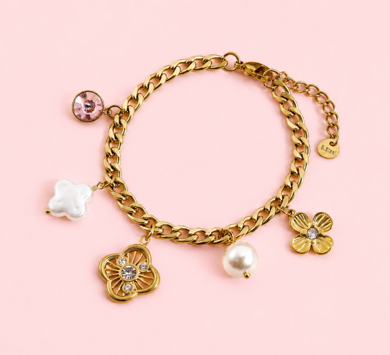 Marina – bracelet doré à charms trèfles et strass rond