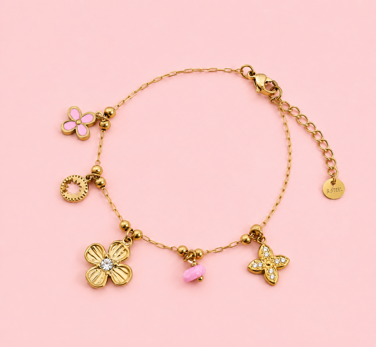 Jasmin - Bracelet doré charms trèfle serti et mini fleur